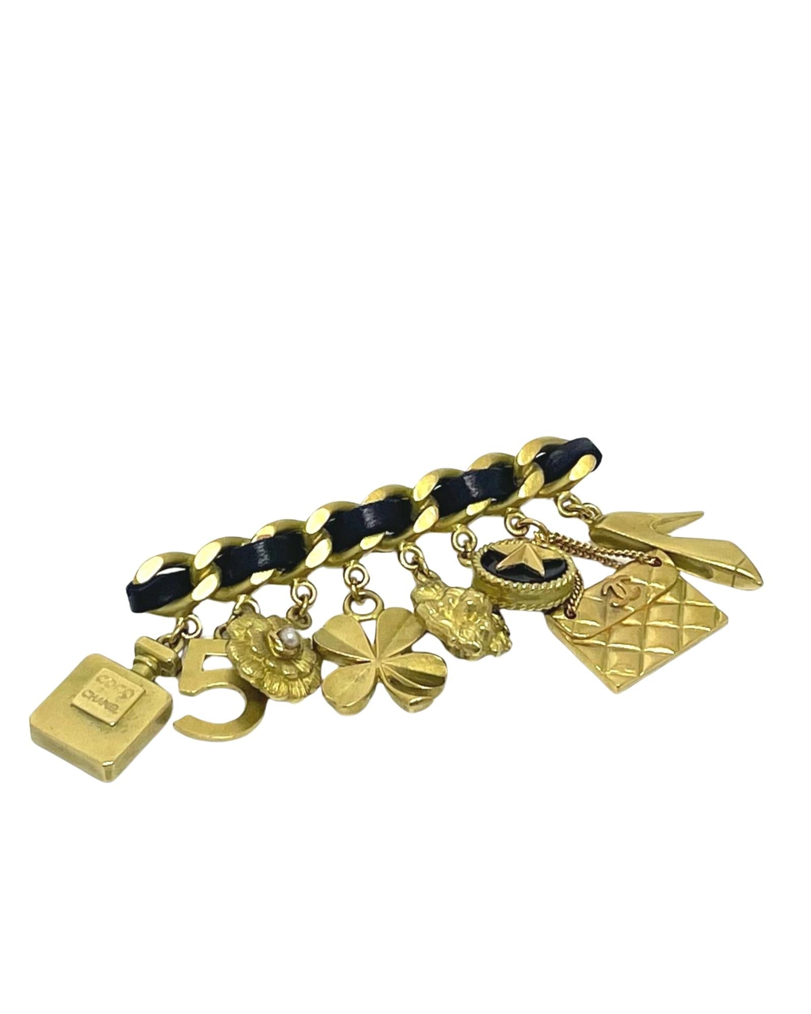Pre-Loved Chanel N°5 Gold-Plated Multi-Charm Brooch | Vintage