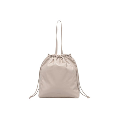 Calvin Klein Beige Polyurethane Drawstring Tote Handbag