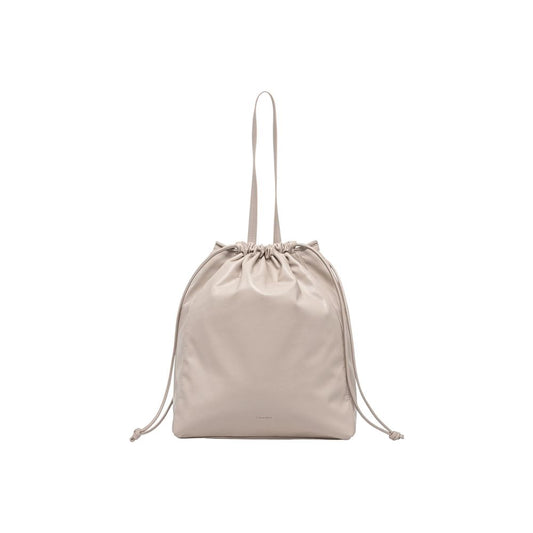 Calvin Klein Beige Polyurethane Drawstring Tote Handbag