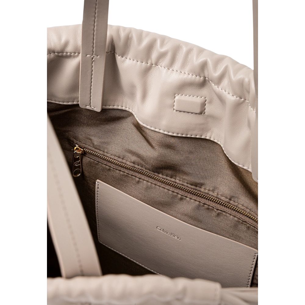 Calvin Klein Beige Polyurethane Drawstring Tote Handbag