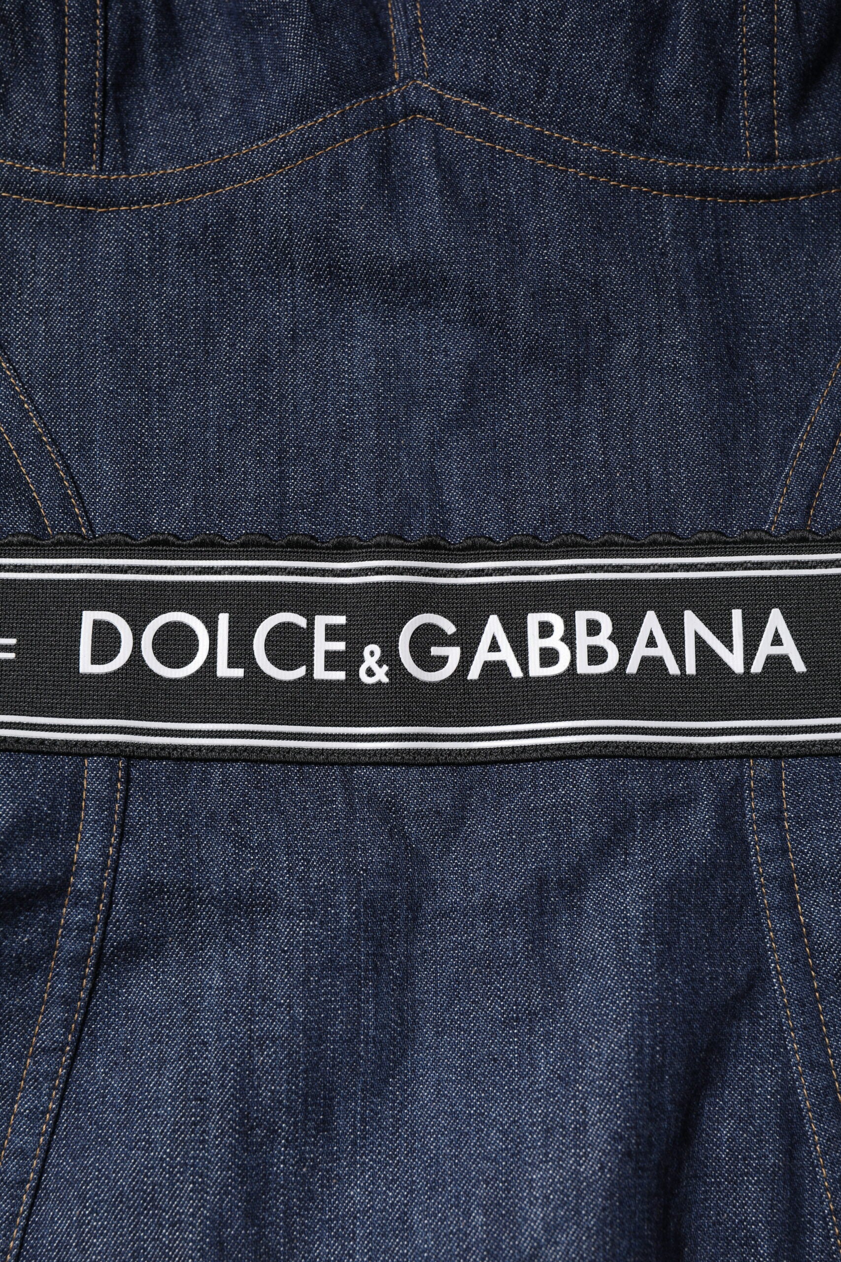 Dolce & Gabbana Blue Stretch Denim Bodysuit with Logo Waistband – Sleeveless Bodycon Fit