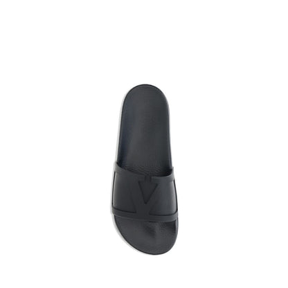 Valentino Garavani Rubber Slides: Luxurious Comfort Meets Iconic Style