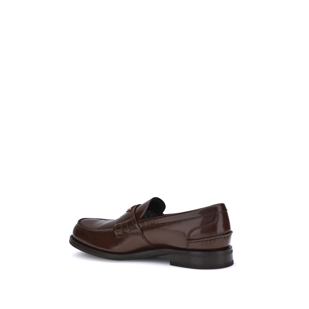 Prada Triangular Plaque Loafers - Timeless Elegance