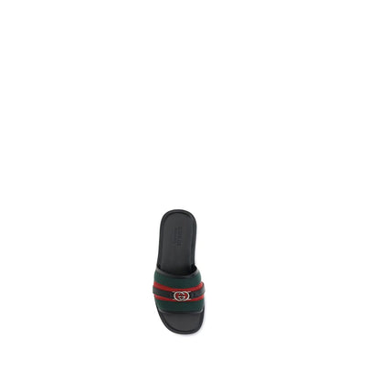 Gucci GG Motif Slider Sandals - Iconic Comfort Redefined