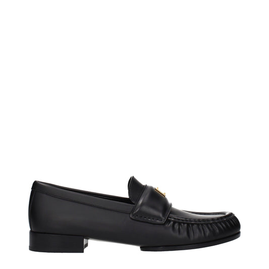 Givenchy Black Leather Slip-On Loafers: Elegant Footwear for the Discerning Individual