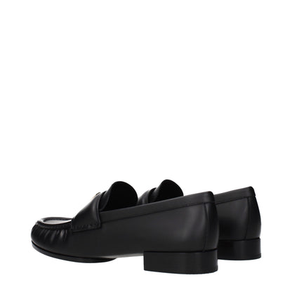 Givenchy Black Leather Slip-On Loafers: Elegant Footwear for the Discerning Individual